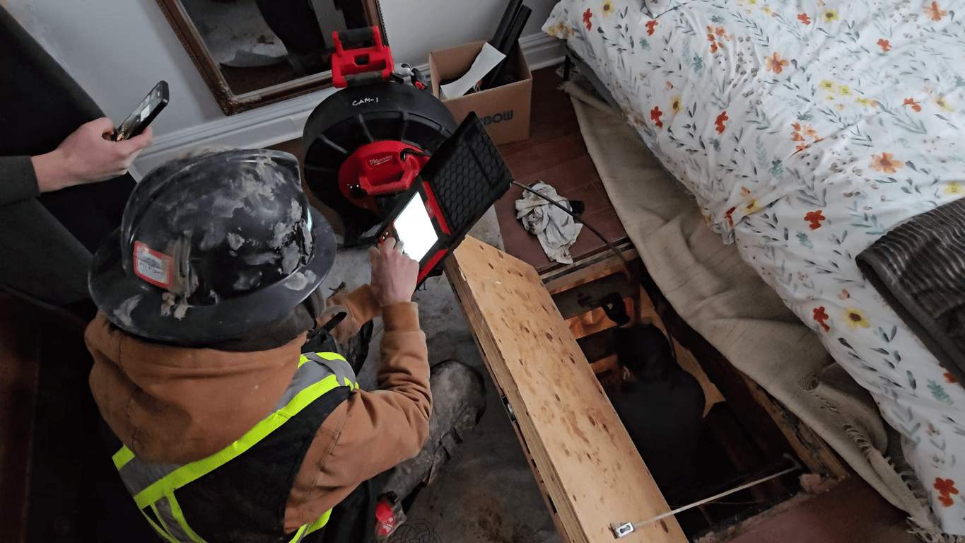 Older home plumbing being inspected in Ottawa