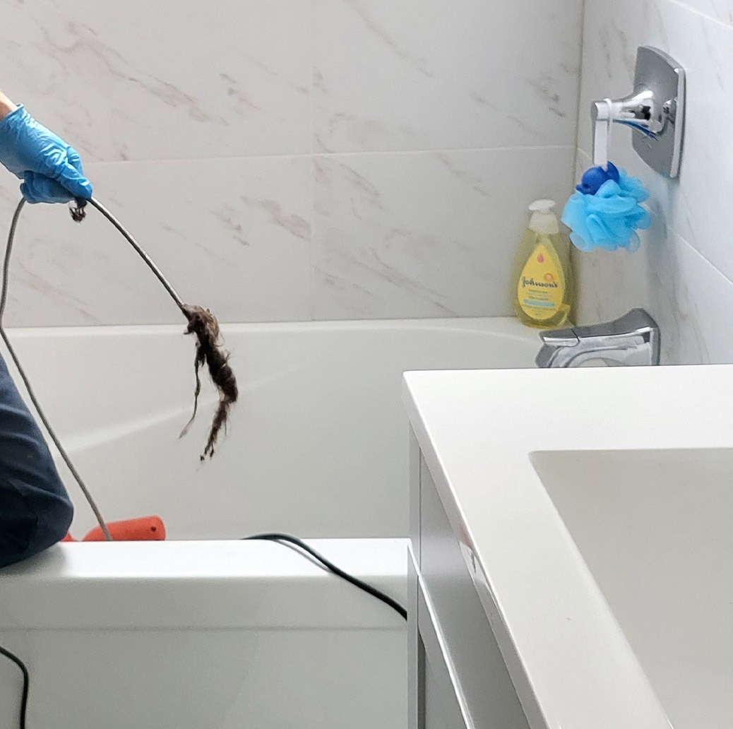 drain cleaning Hamilton clogged bathtub