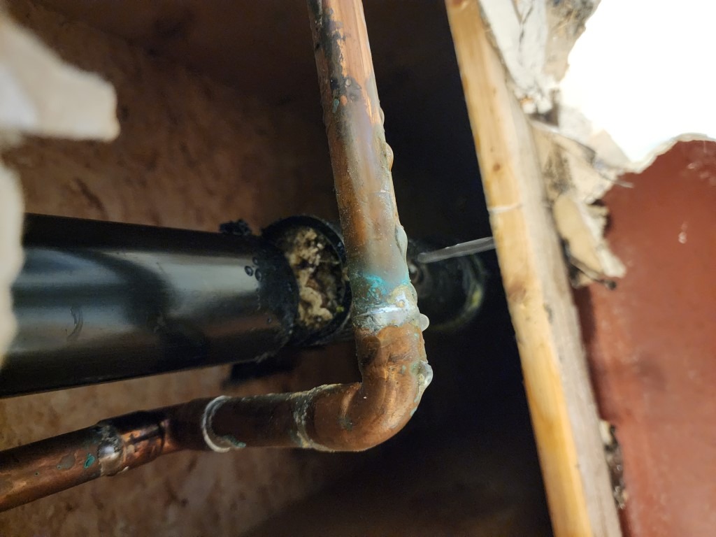 Drain pipe being accessed for drain repair