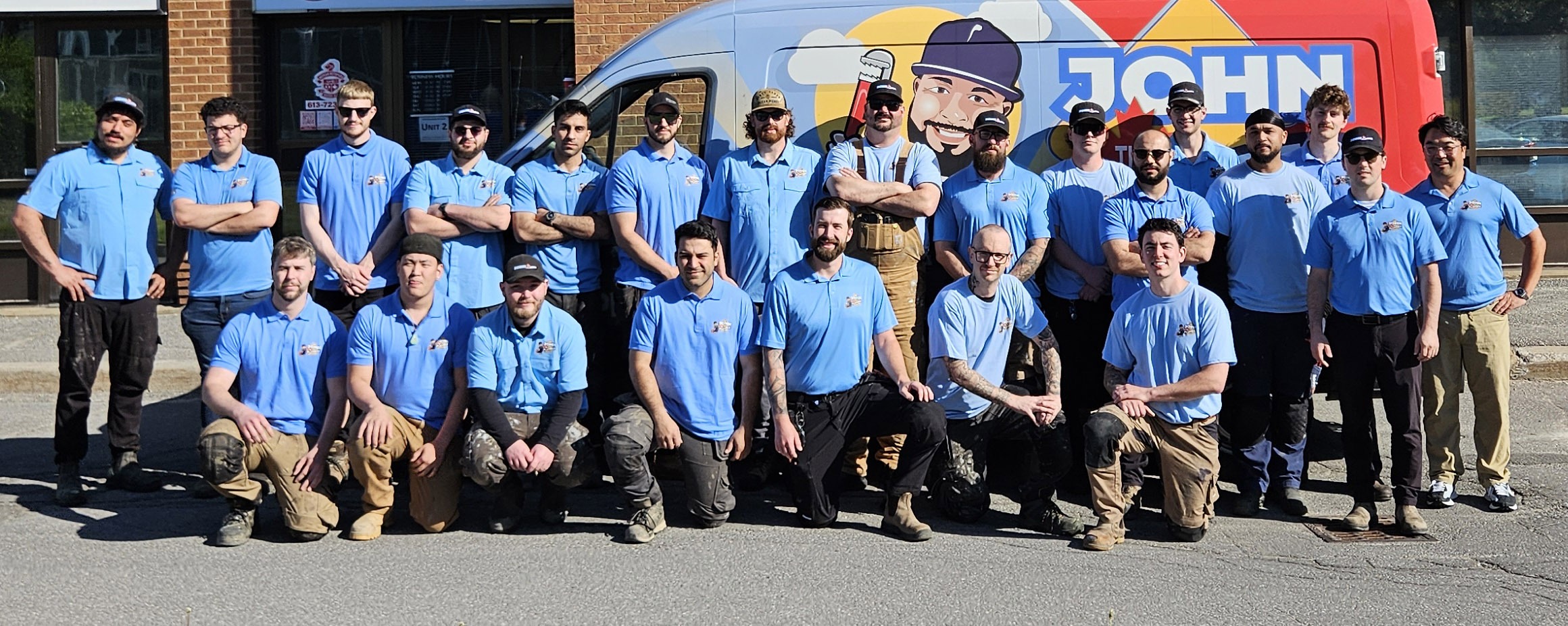 John The Plumber plumbing team with branded service van