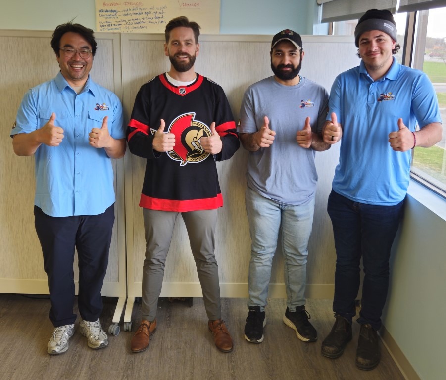 John The Plumber team members showing their Ottawa Senators pride
